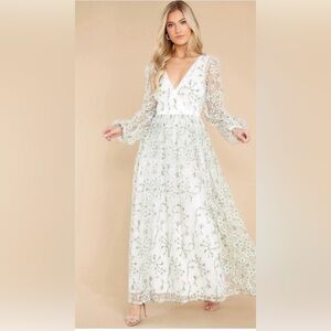 Beautiful white embroidered flowers, maxi dress w/ long sleeves. Only worn once.